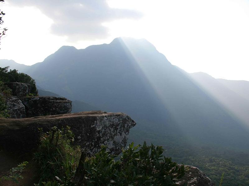 A rocky viewpoint over the misty Knuckles Range at Riverston, Sri Lanka